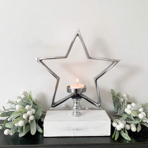 Silver Star Tea-Light Holder On White Wooden Base