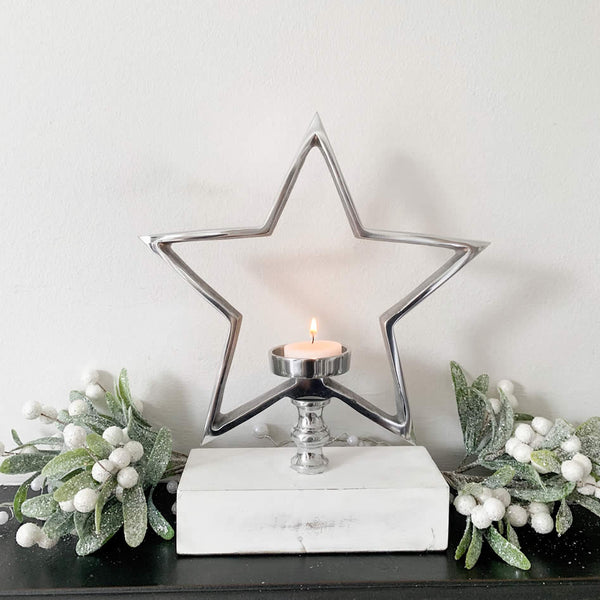 Silver Star Tea-Light Holder On White Wooden Base